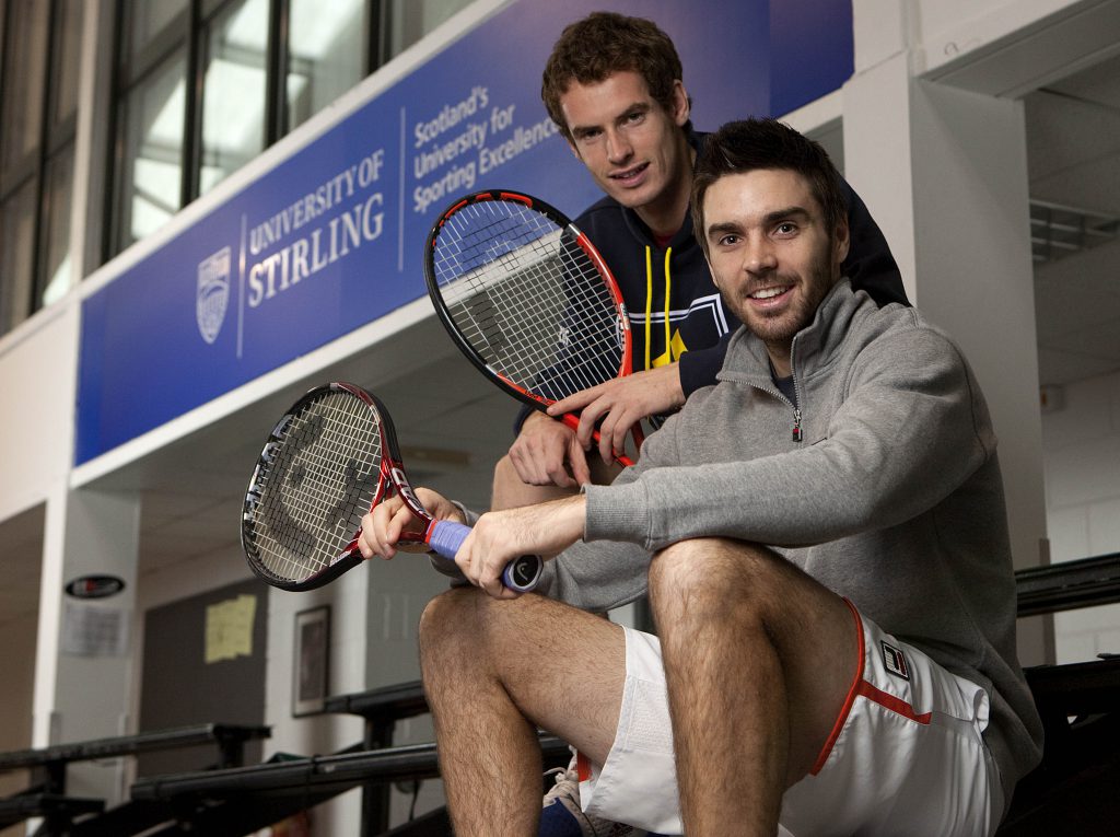 Andy Murray and another tennis player at the Scottish Tennis Centre