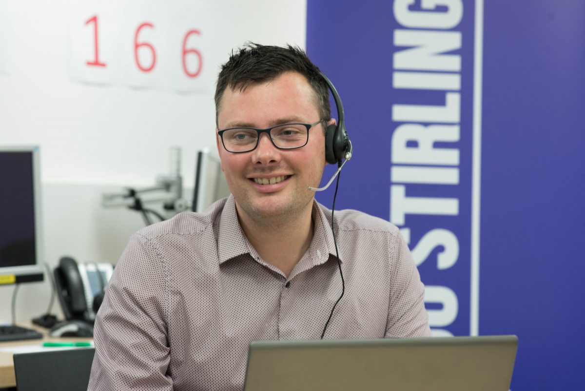 University of Stirling staff member Neil McGillivray working on the Stirling UCAS Clearing helpline.